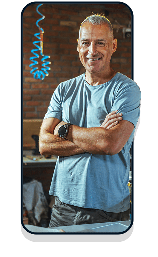 Business owner in blue t-shirt in mobile frame
